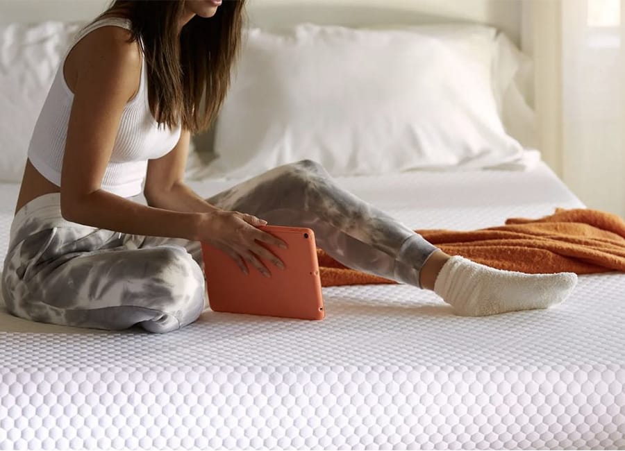 Woman laying on kapok pillow