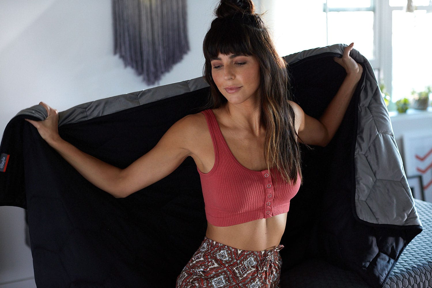 Couple laying on kapok pillows